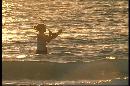 Picture-of-a-girl-flyfishing-on-the-beach